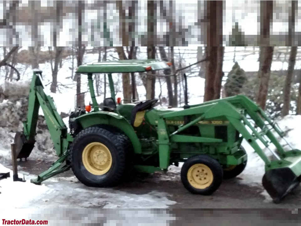 John Deere 1050 tractor with model 75 loader and model 8 backhoe.