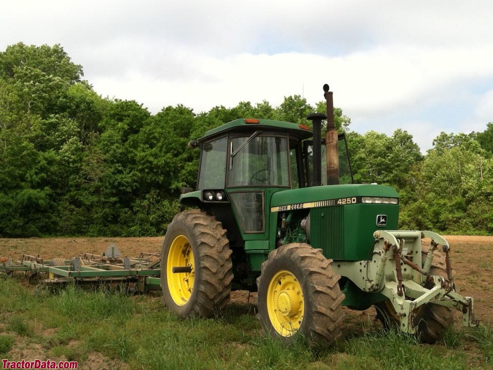 US model four-wheel drive John Deere 4250 discing.