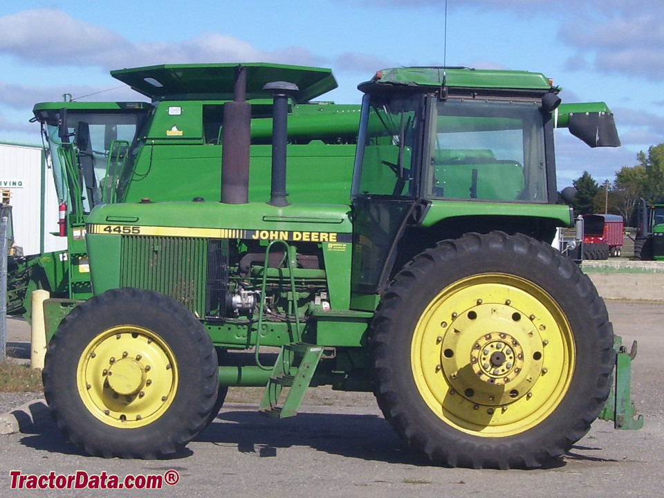 John Deere 4455 tractor with four-wheel drive, left side.