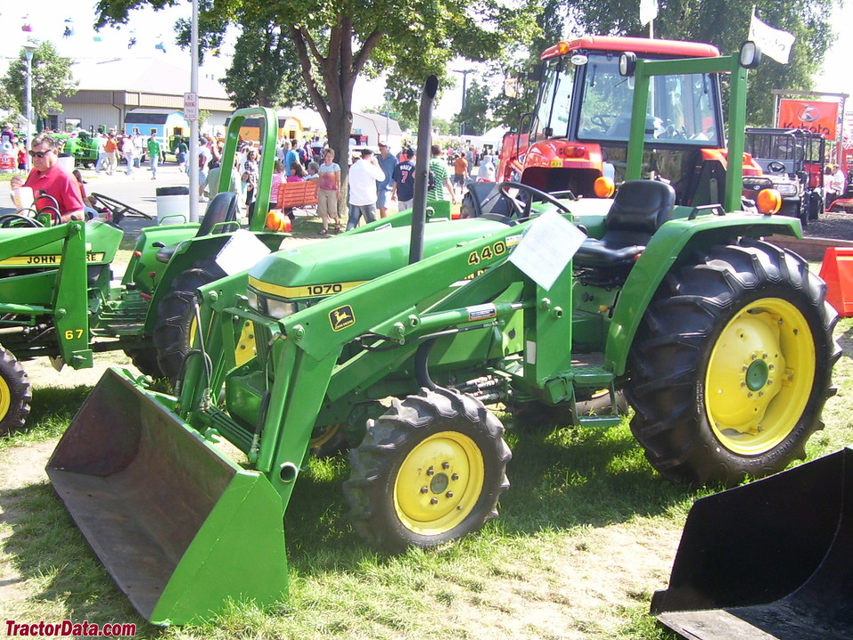 John Deere 1070 with four-wheel drive and front end loader.