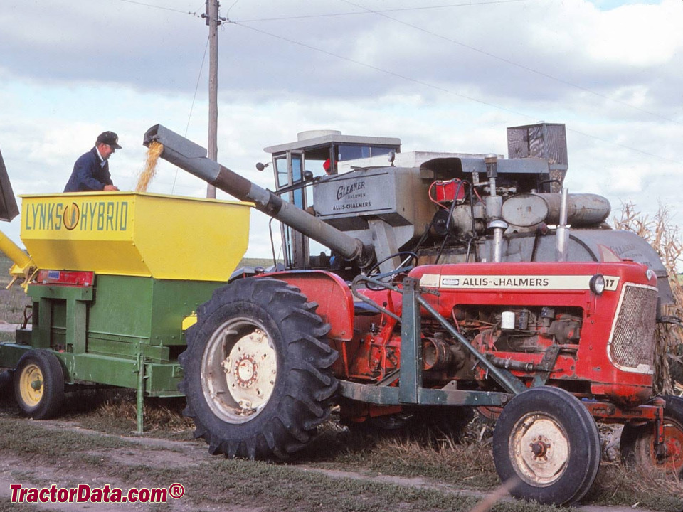 Allis-Chalmers D17 hauling corn from a Gleaner combine