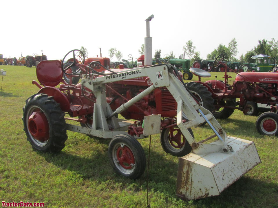Farmall Super A with IH 1000 front-end loader.