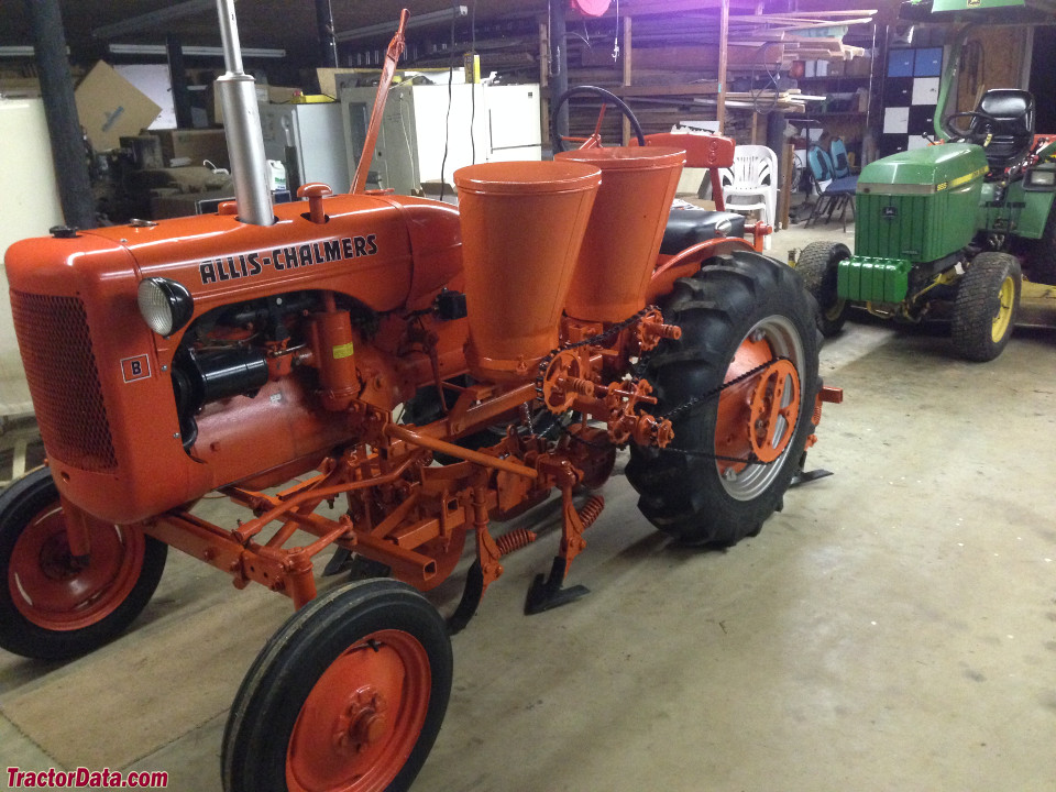 Allis-Chalmers B with 60 series cultivators and 601A planter/fertilizer side dresser.