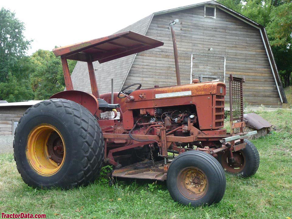 International 340 with belly-mount mower.