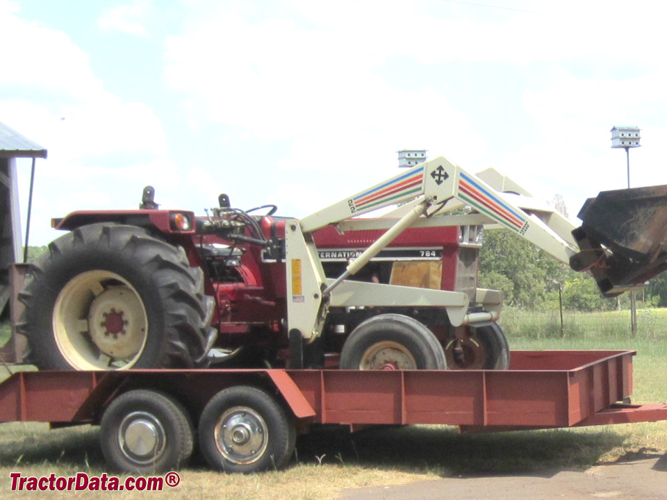 International 784 with front-end loader, right side.