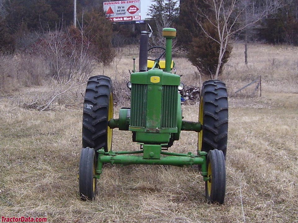 John Deere 720 diesel with after-market wide front end.
