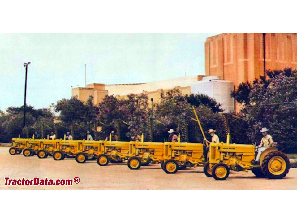 Nine new John Deere 320U mowing tractors in 1957.
