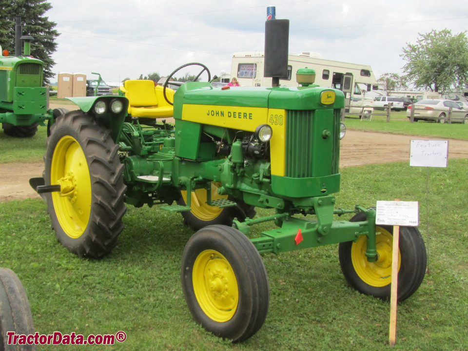 John Deere 430T Tricycle with wide front axle.