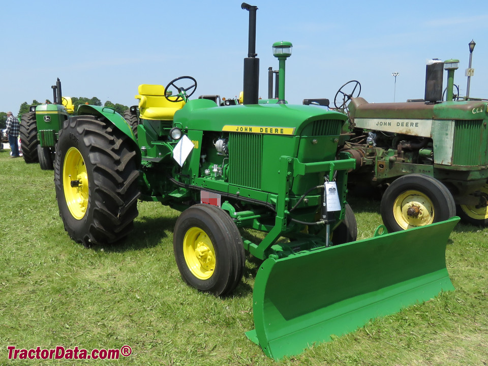 John Deere 3010 Standard tractor with 523 front dozer blade.