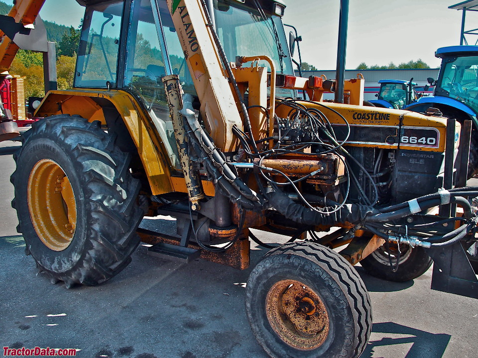 Ford-New Holland 6640 with boom mower