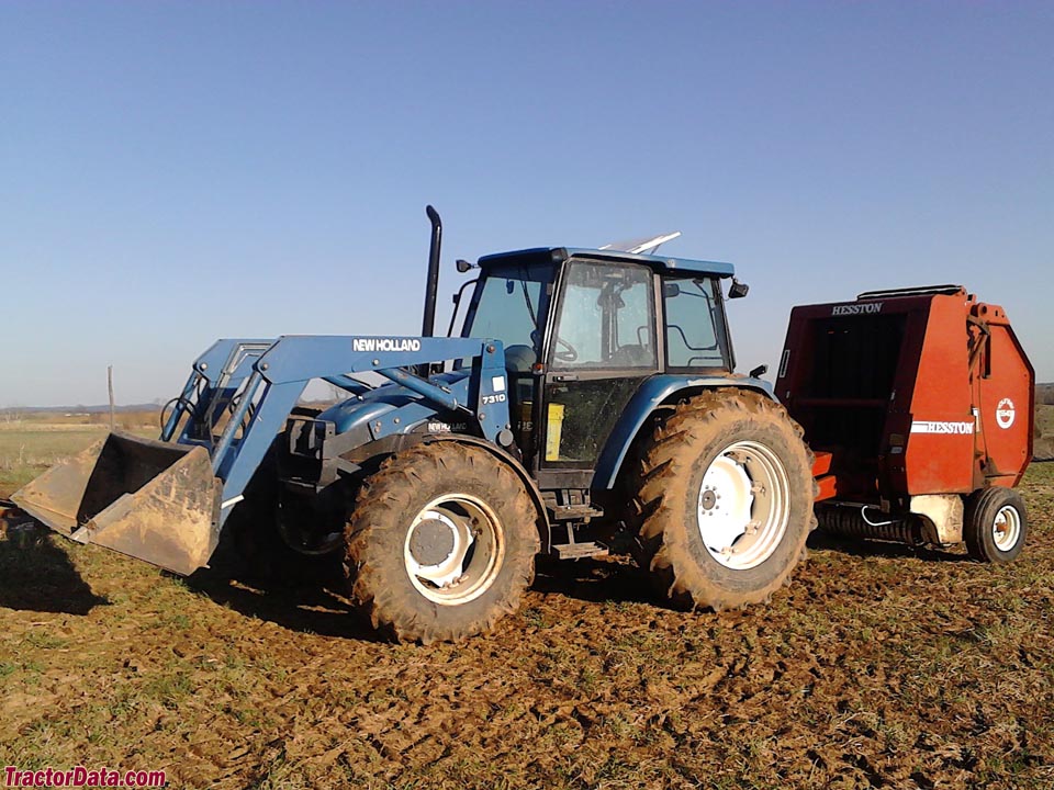 New Holland 7635 with model 7310 front-end loader.