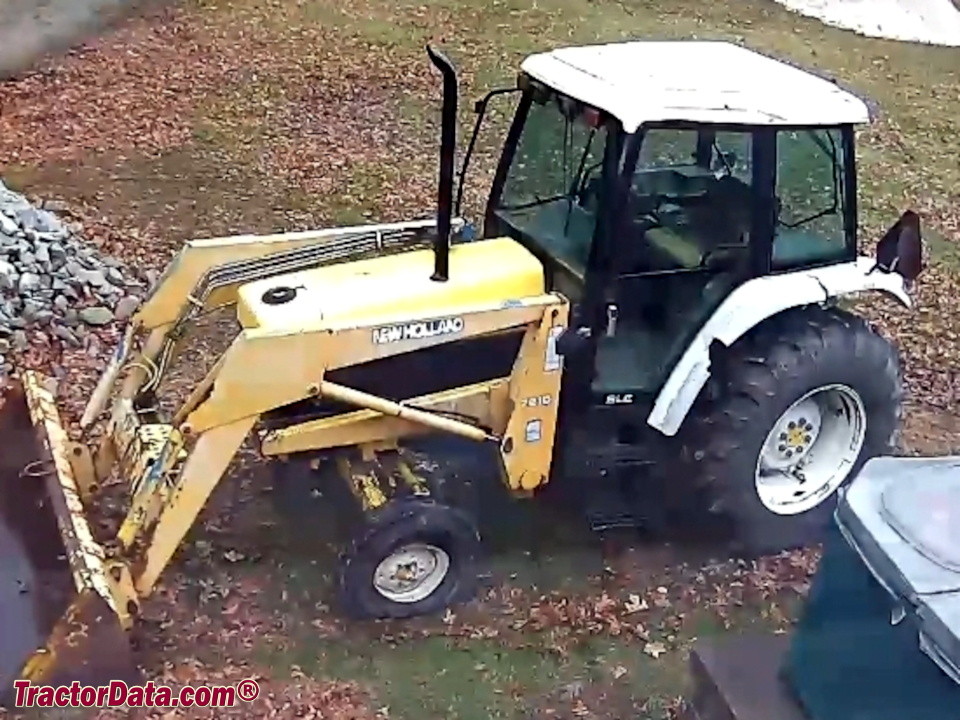 New Holland 7740 with 7210 front-end loader, left side.