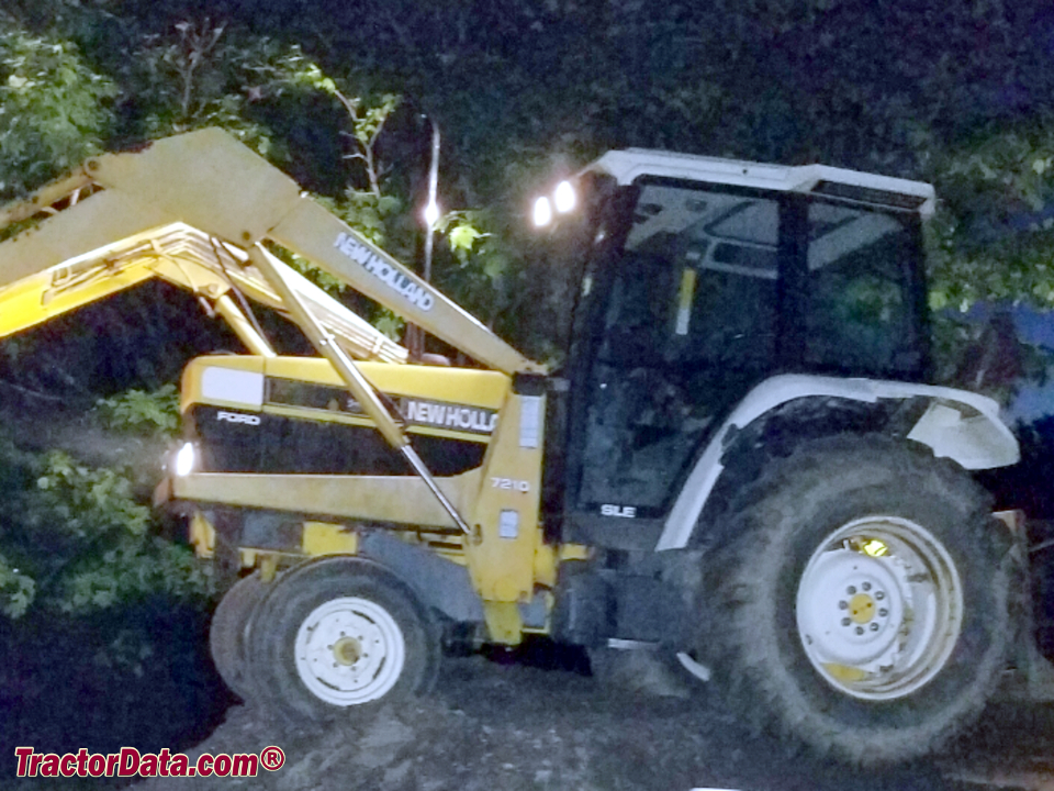New Holland 7740 with 7210 front-end loader, left side.