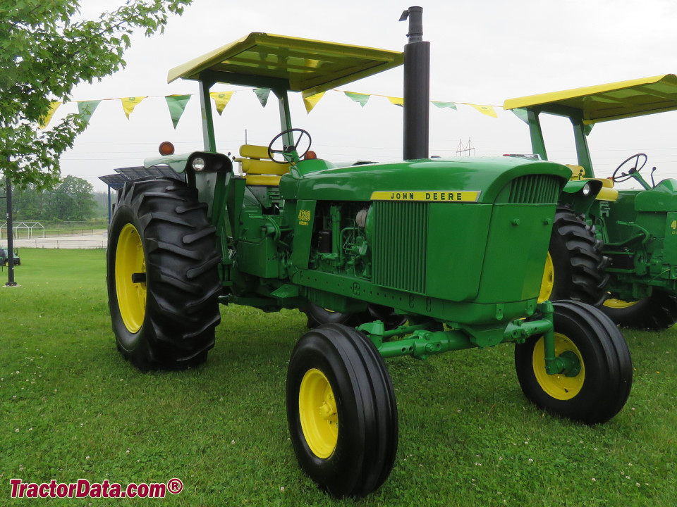Two-wheel drive John Deere 4320 with ROPS.