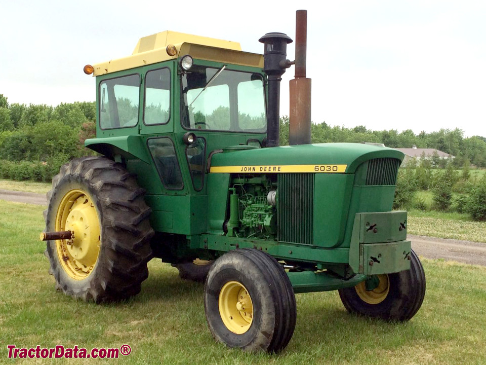 John Deere 6030 tractor with factory cab.