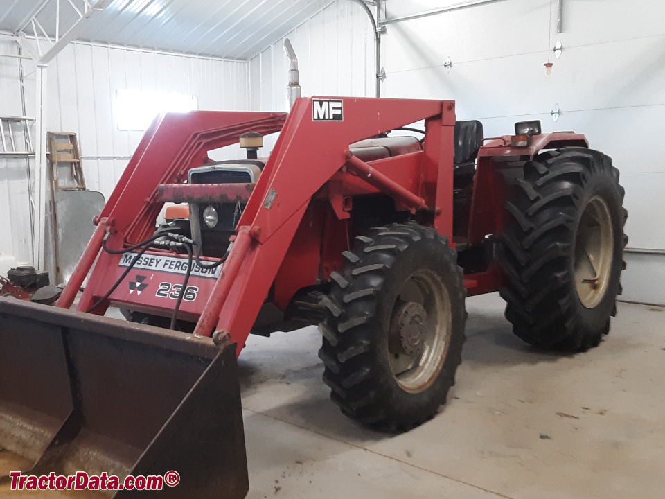 Massey Ferguson 294 with model 236 front-end loader, left side.