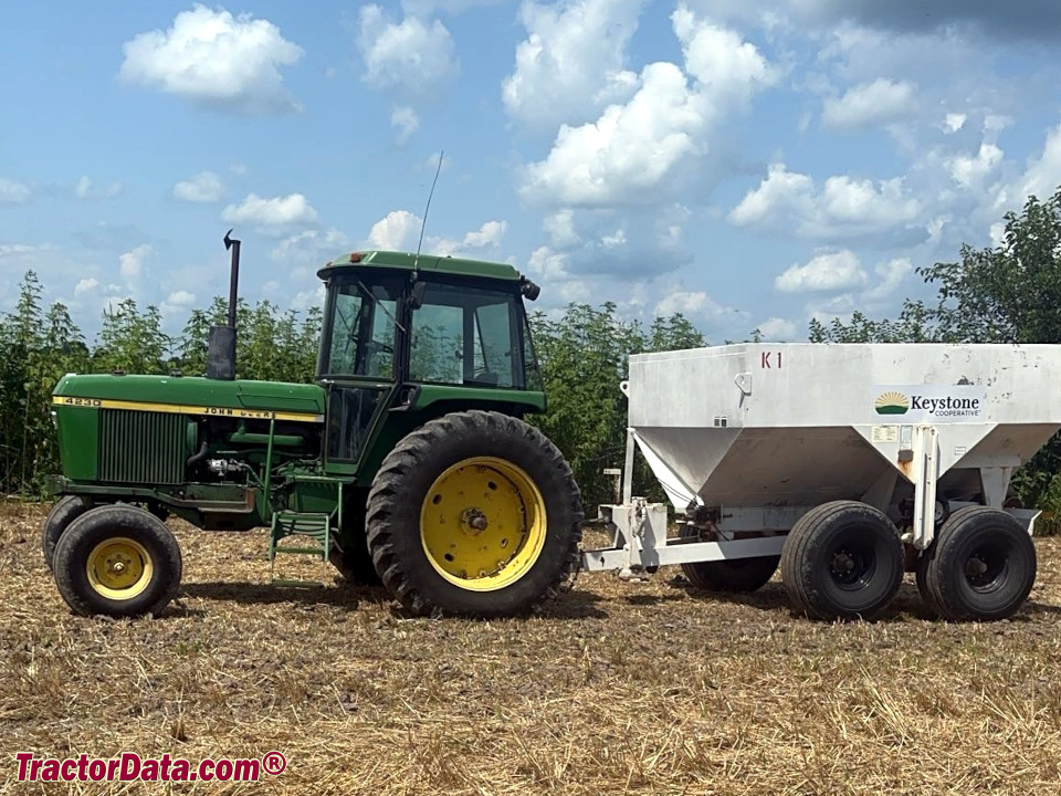 John Deere 4230 with gravity wagon.