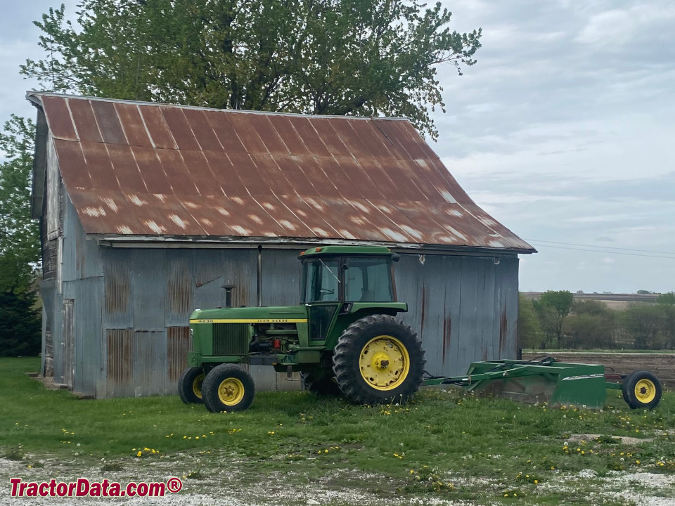 1977 John Deere 4230 with box scraper.