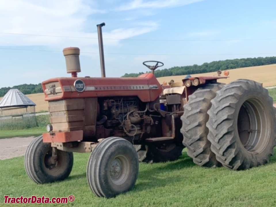 Open-station Massey Ferguson 1130 with duals.
