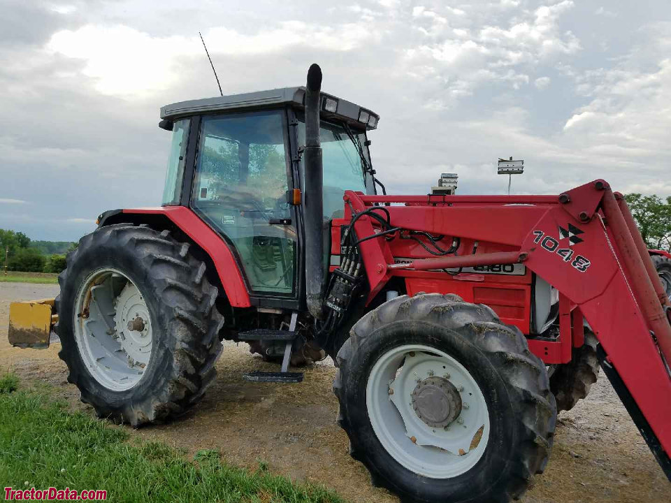 Massey Ferguson 6180 with 1048 front-end loader.