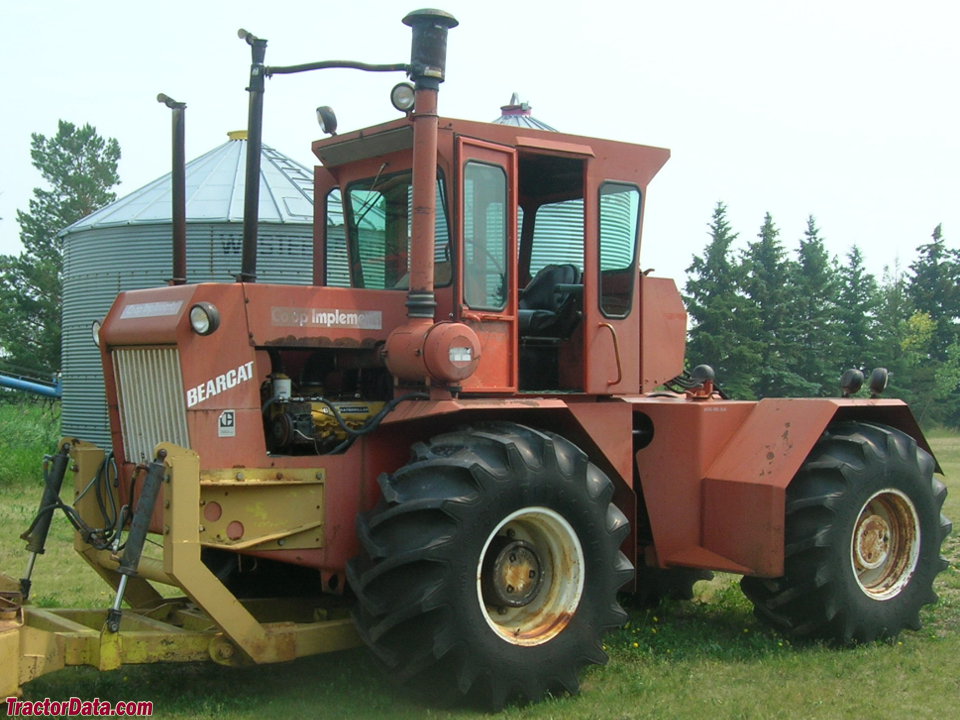 CO-OP Implements red Steiger Bearcat.