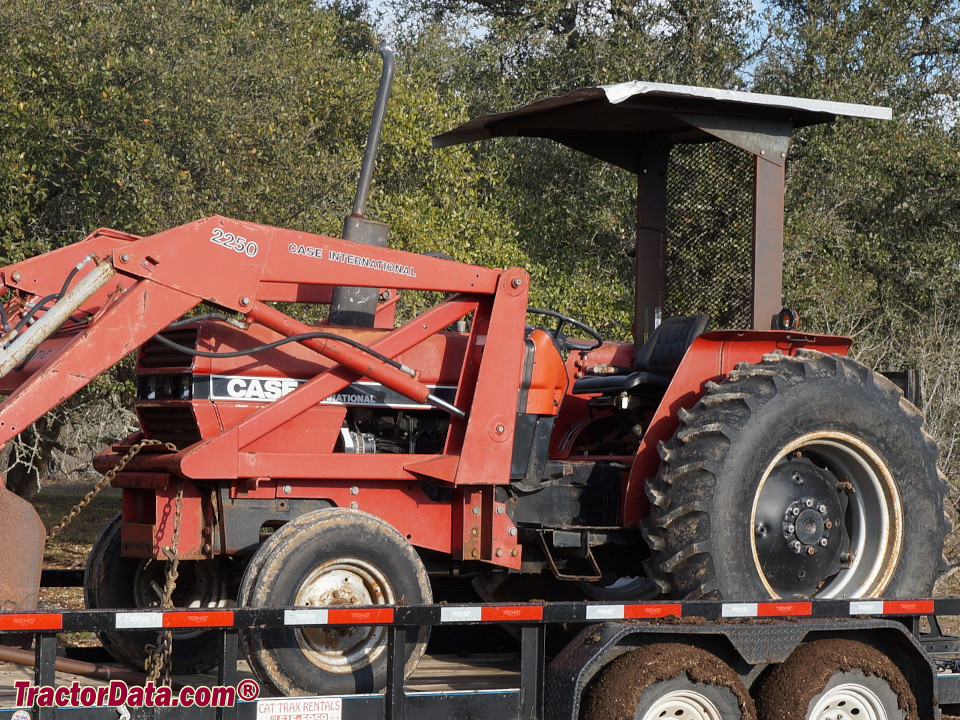 Case International 685 with 2250 front-end loader, left side.