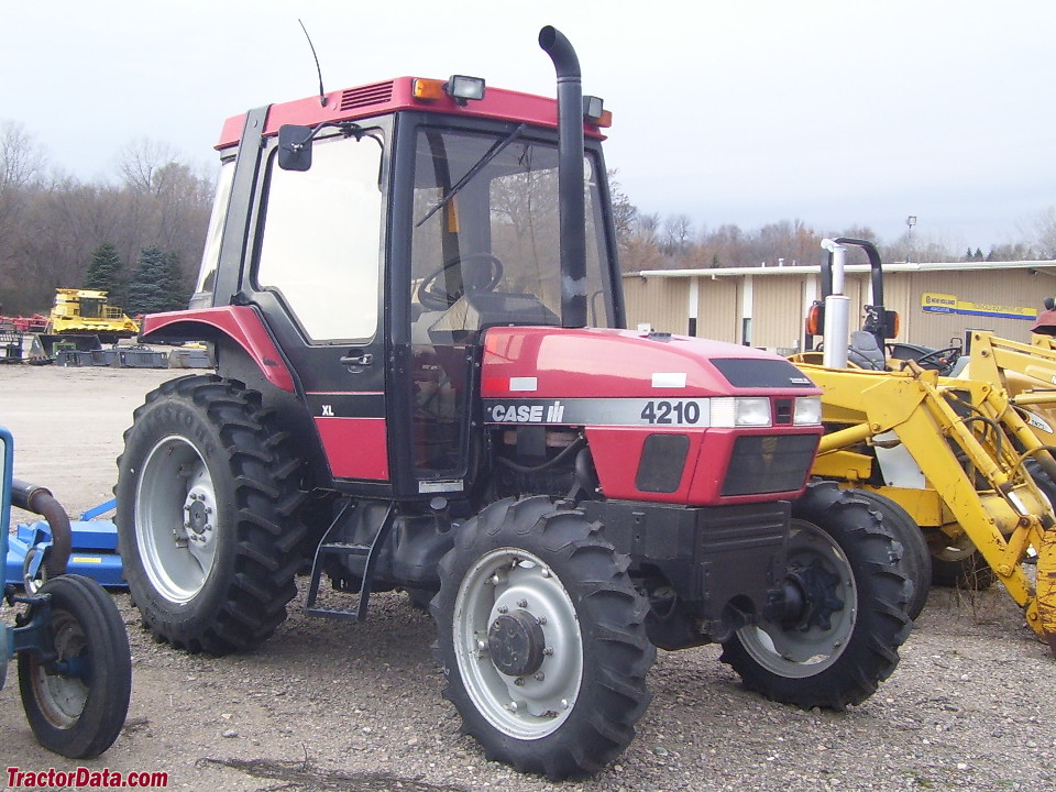 Case IH 4210 utility with cab and four-wheel drive.