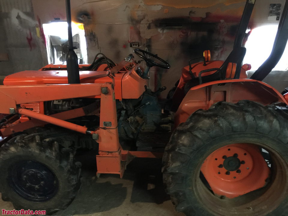 Kubota L275 with front-end loader.