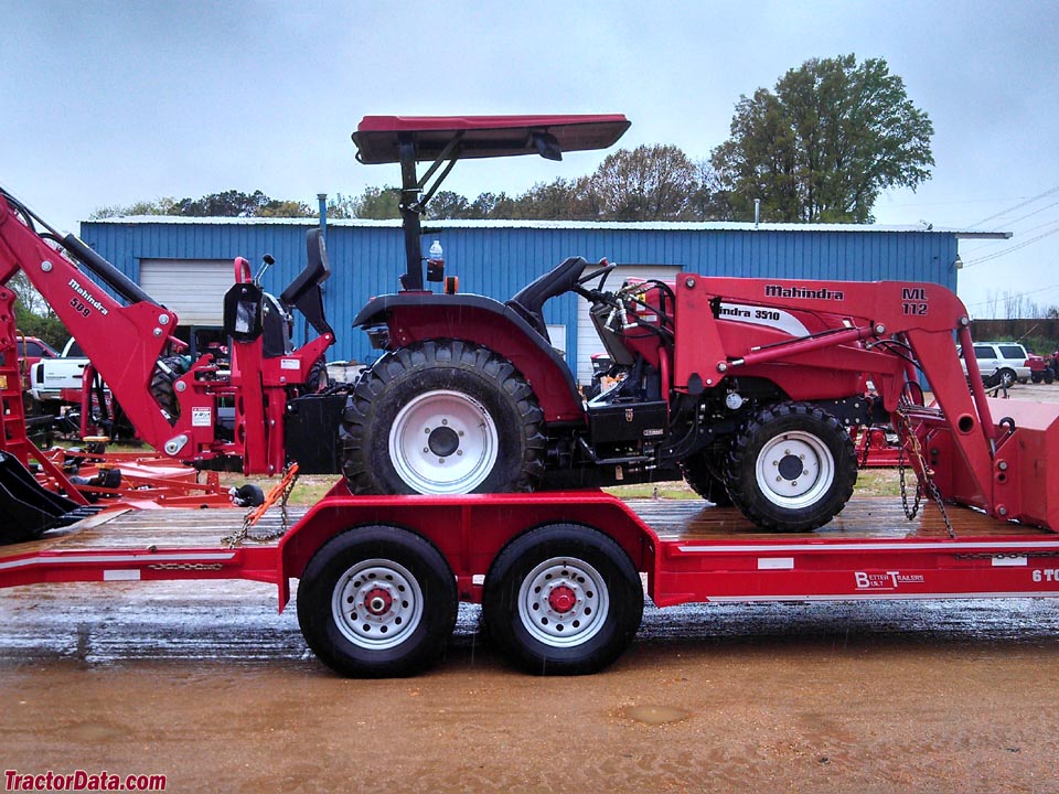 Mahindra 3810 with ML112 front-end loader and 509 backhoe, right side.