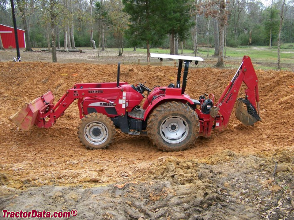 2007 Mahindra 6520 with KMW ML275 loader and Bradco 511 backhoe.