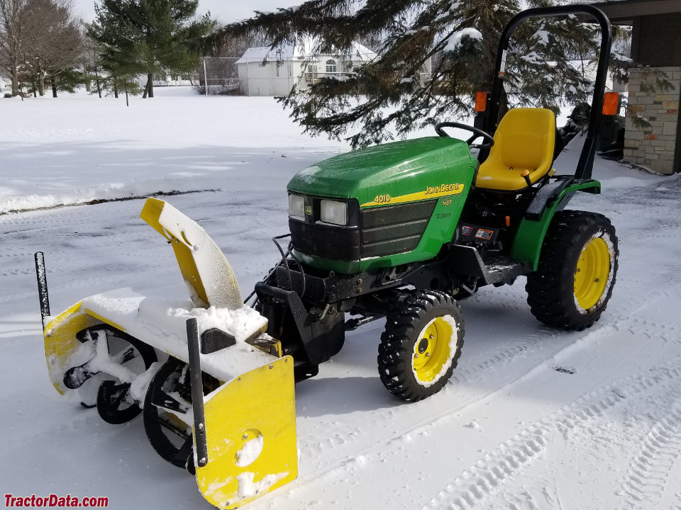 John Deere 4010 with front-mount snowblower.