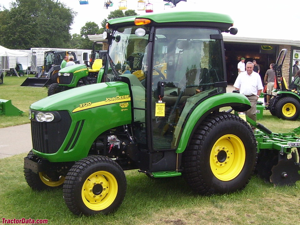 John Deere 3720 with cab, right side.