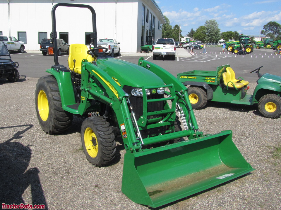 John Deere 3720 with ROPS and loader.