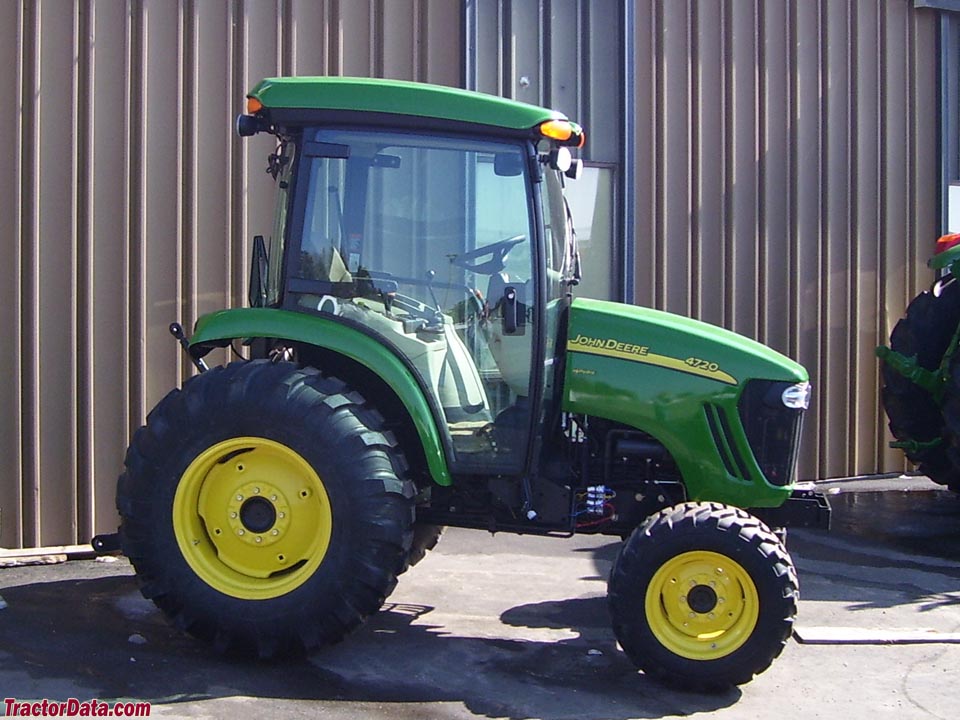 John Deere 4720 utility tractor with cab.