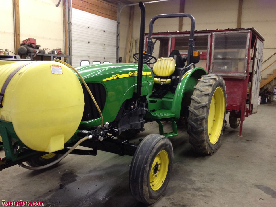 John Deere 5225 with two-wheel drive and ROPS.