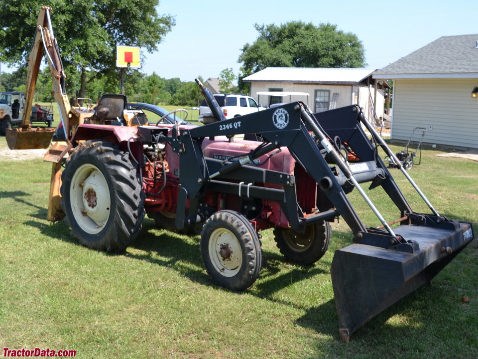 Mahindra 450 with loader and backhoe.