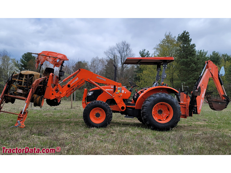 Kubota M6040 with LA1153 front-end loader and Woods backhoe.