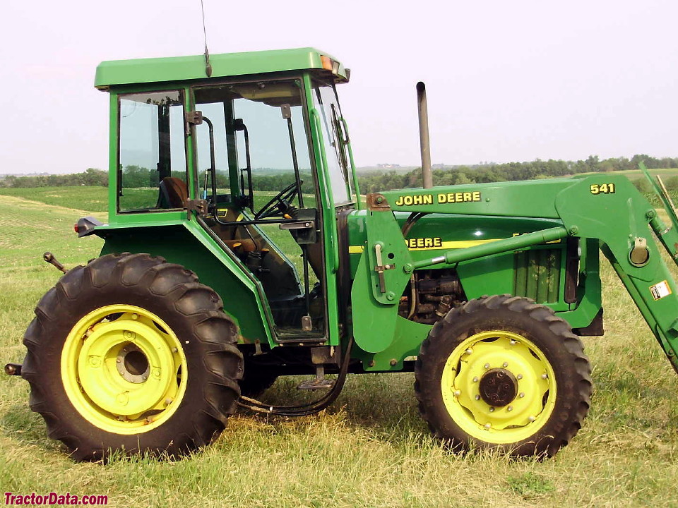 Four-wheel drive John Deere 5410 with cab and model 541 loader.