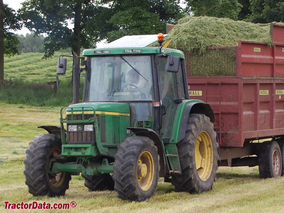 John Deere 6110 utility tractor with cab.