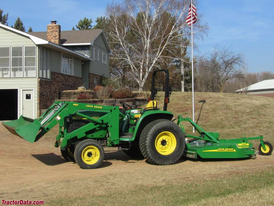 John Deere 4500 with model 460 front-end loader and MX6 rotary cutter.