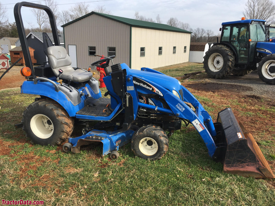 New Holland TZ18DA with 10LA front-end loader and 54CMS mower deck.