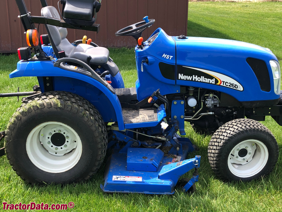 2005 New Holland TC26DA with 914A 60-inch mid-mount mower .