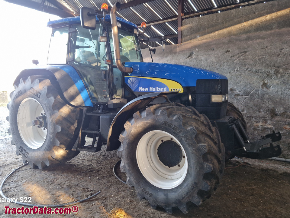 New Holland TM190 row-crop tractor, left side.