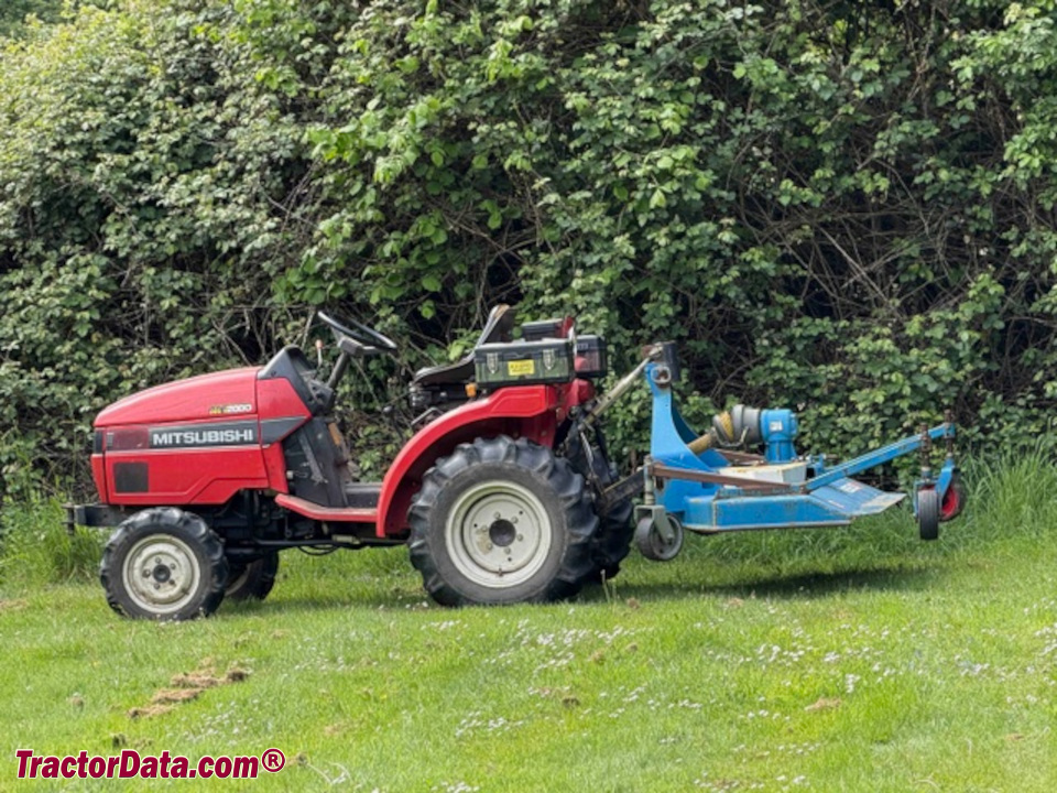 Mitsubishi MT200D compact utility trctor with rear finish mower.