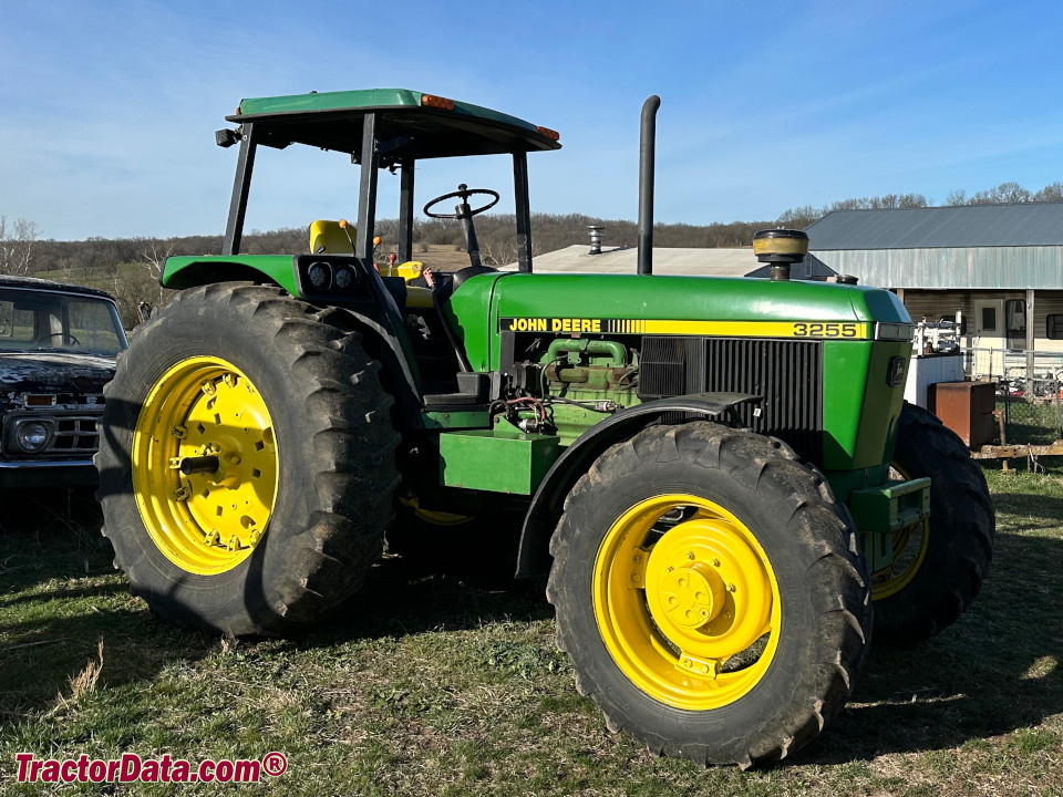 John Deere 3255 utility tractor with ROPS, right side.