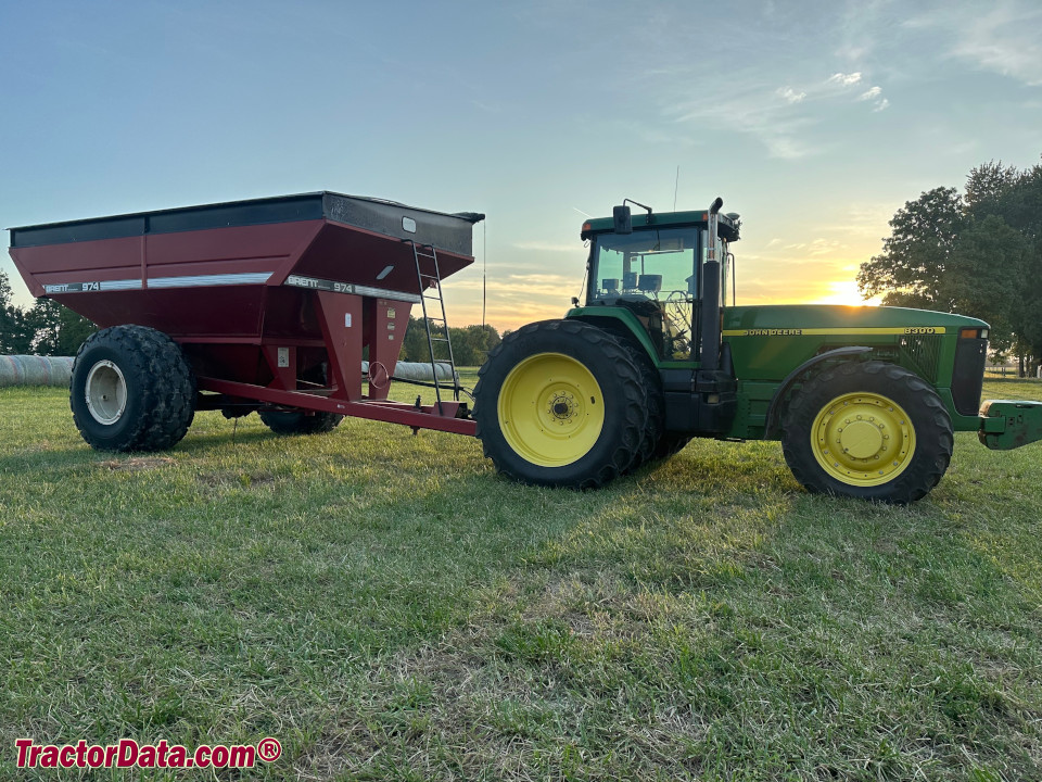 John Deere 8300 with Brent 794 gravity wagon.