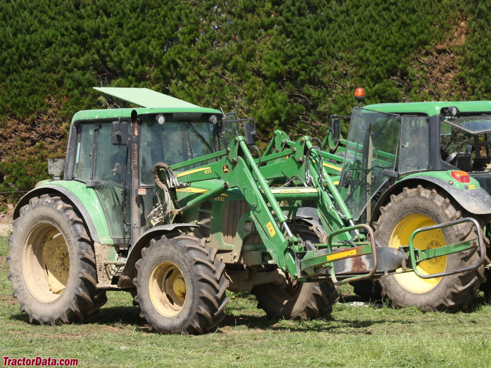John Deere 6330 with cab and model 633 front-end loader.