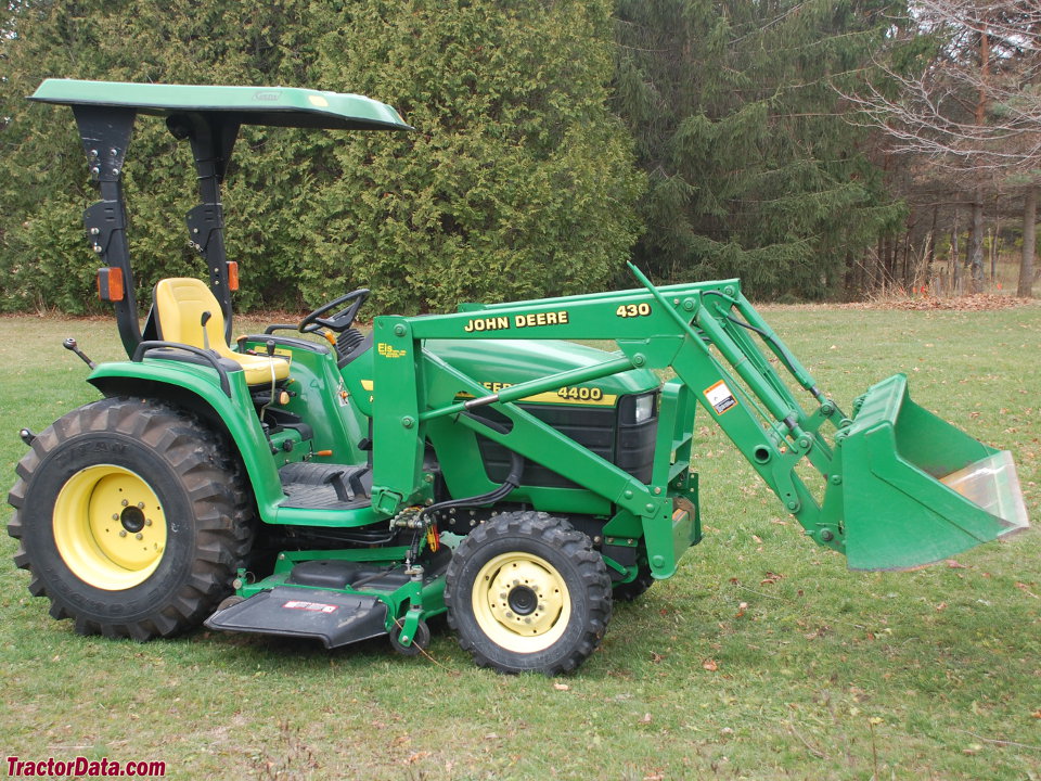 John Deere 4400 with 430 loader and mid-mount mower deck.