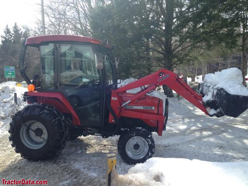 Massey Ferguson 1429 with MF1466 front-end loader and Simms cab.