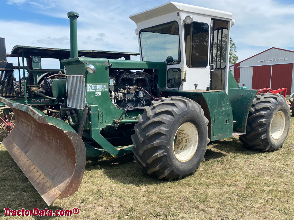 Knudson 220 four-wheel drive tractor with dozer blade, left side. This is the first Knudson tractor built.